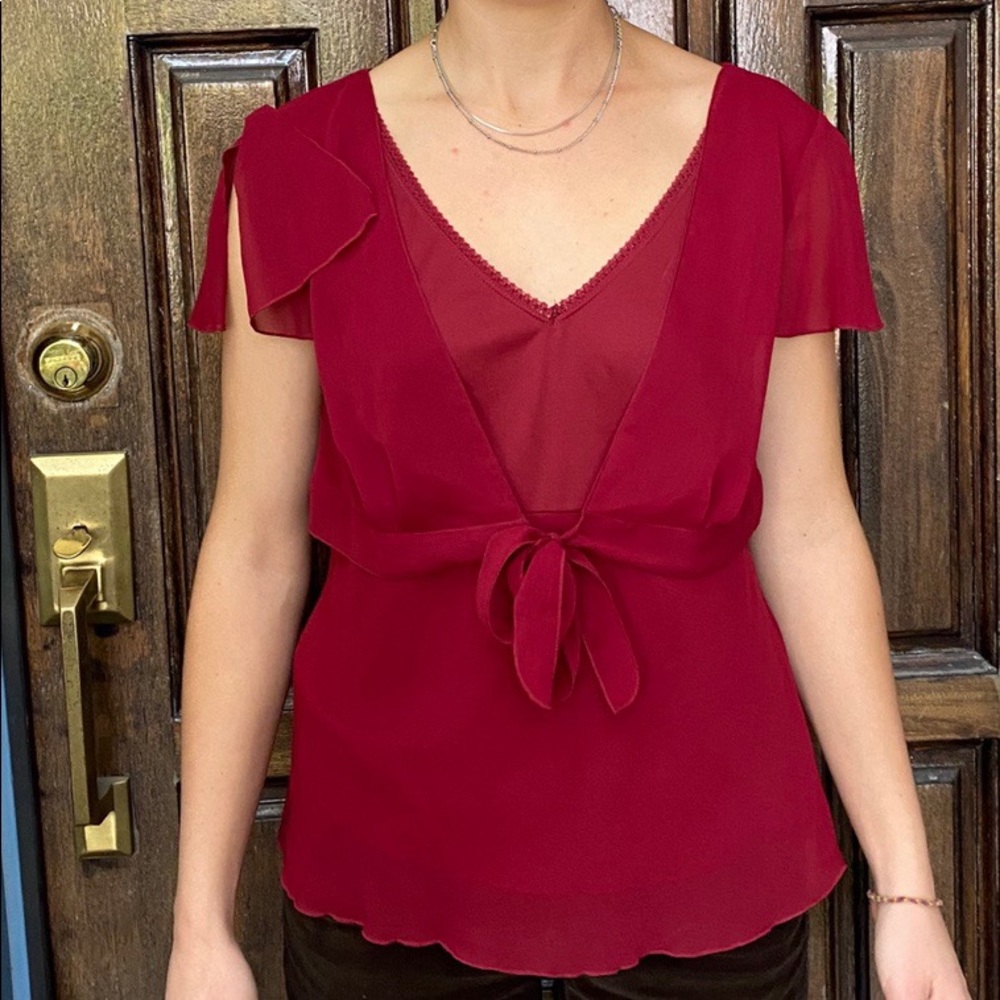 flowy red blouse